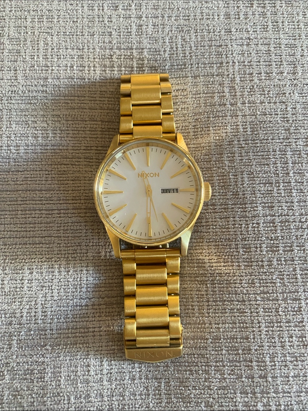 Nixon Sentry Gold Tone Watch with White Dial and Date Window